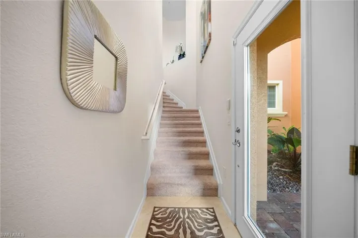 Entry way through garage and front door.