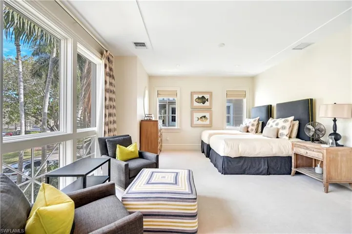 Bedroom with carpet and baseboards