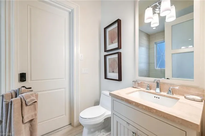 Bathroom with toilet and vanity