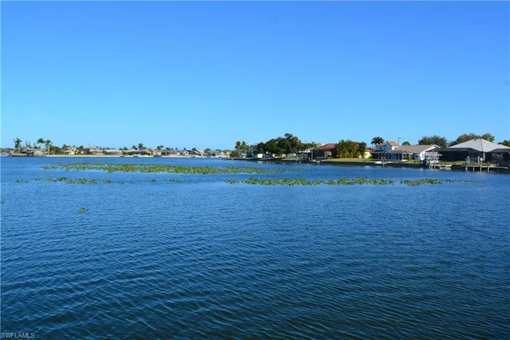 Water view featuring nearby suburban area