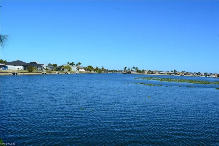 Water view featuring nearby suburban area