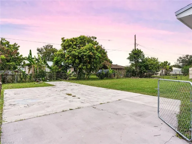 Expansive concrete pad with perimeter fencing