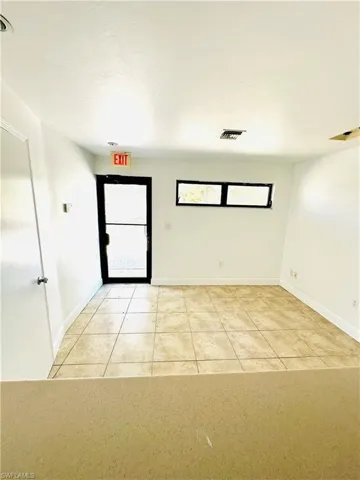 View of tiled spare room