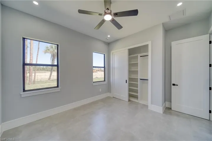 Bedroom #3 with visible vents, a ceiling fan, recessed lighting, a closet