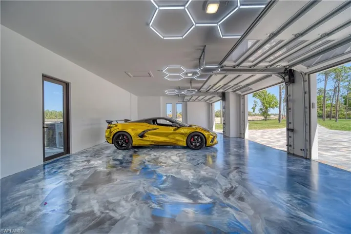 3 Car Garage with Metallic epoxy flooring