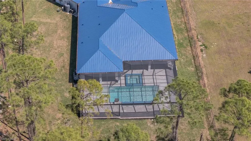 Aerial view of property &  pool area