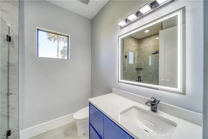 Bath #4 (Pool) with vanity, smart toilet, a shower stall.