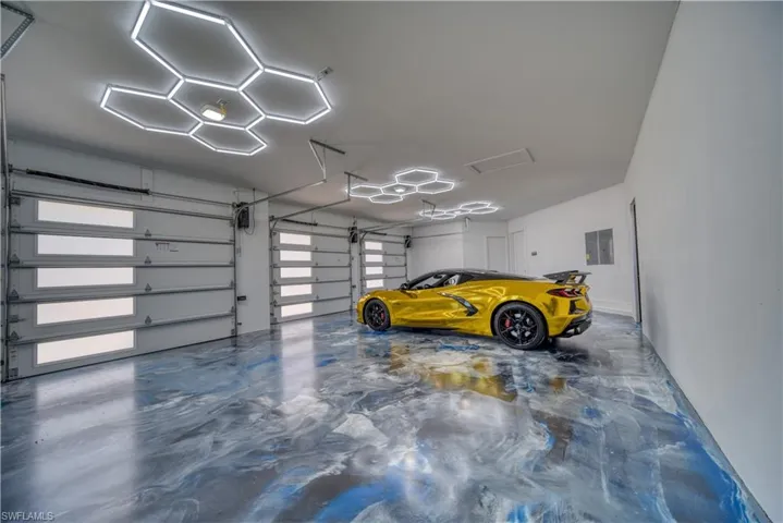 3 Car Garage with Metallic epoxy flooring