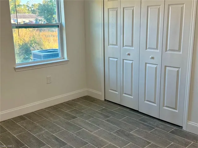 Unfurnished bedroom featuring a closet