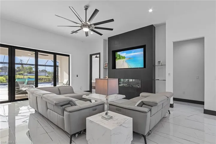 Tiled living room with ceiling fan