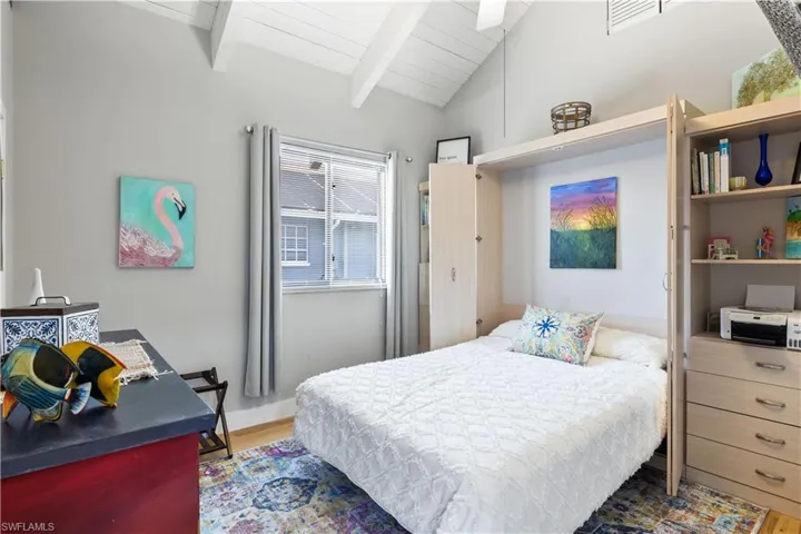 View of the queen size luxury Murphy bed! Not only a space saver and absolutely beautiful piece of furniture but is also both functional and fun!