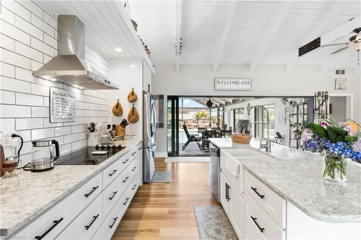 Side angle view of the kitchen layout including the farmhouse sink and those views!!!!!!!!!!!!!!!!