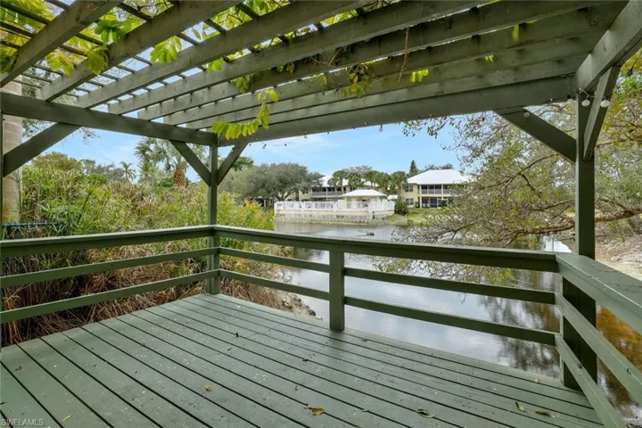 Common trellis deck area next to the pool
