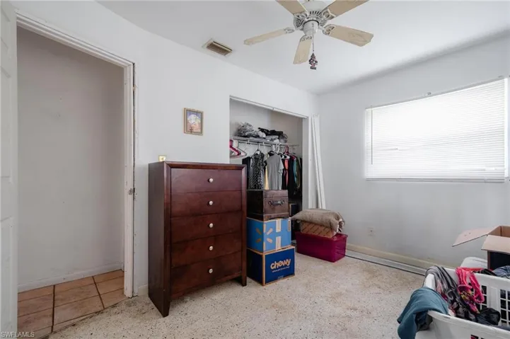 Living area featuring ceiling fan