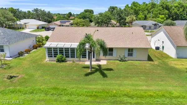 View of front of property featuring a front yard