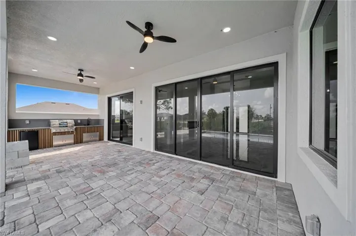 View of patio / terrace with a ceiling fan