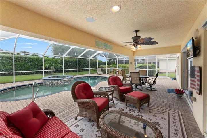 Covered lanai looking out to pool