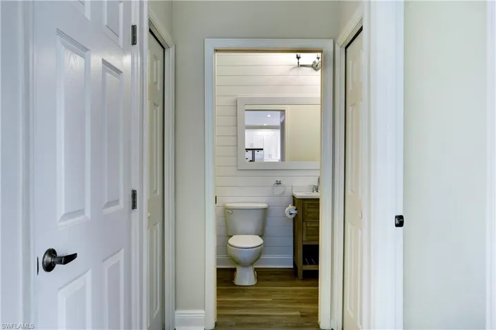 1st floor bath next to 1st floor bedroom.