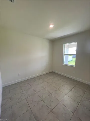 View of tiled empty room