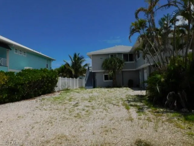 View of yard featuring stairs