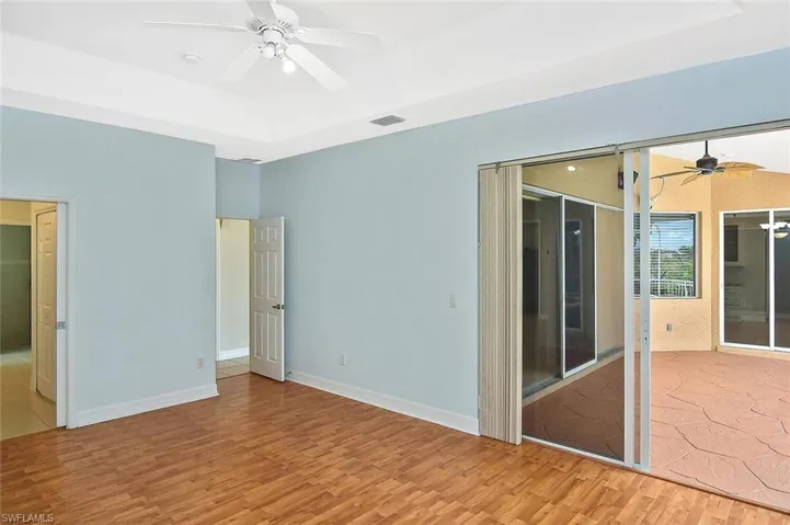 Master Bedroom with sliding doors to pool area