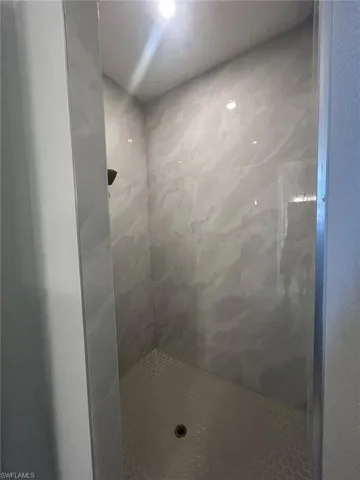 Bathroom featuring a stall shower