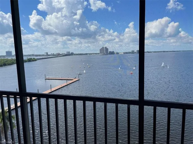 Water view with a dock