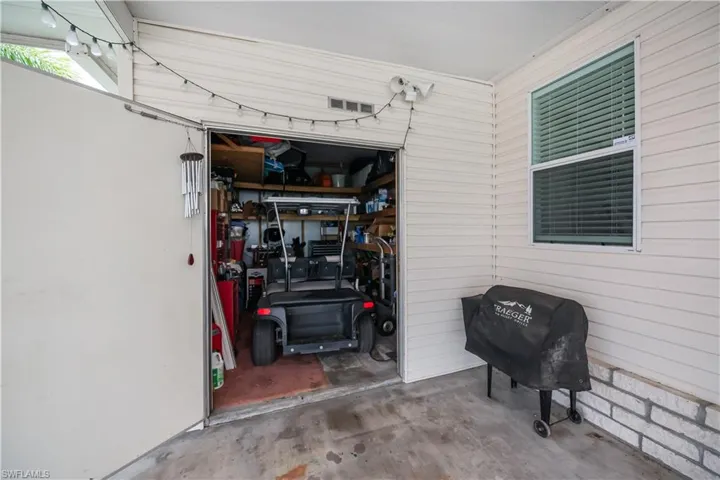 Massive shed off carport