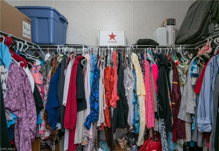 His/Hers walk-in closets in primary