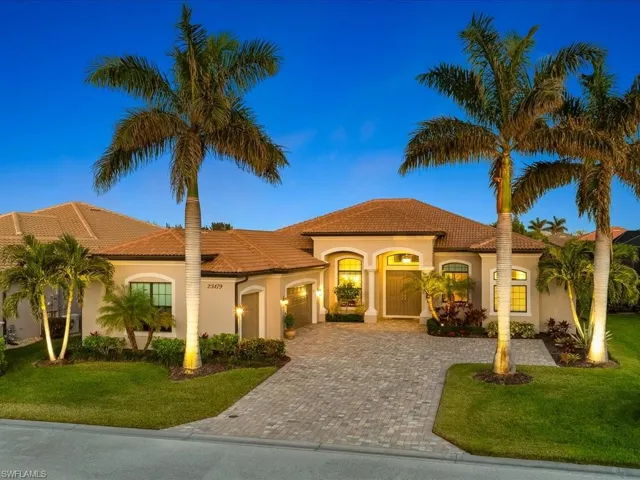 Mediterranean / spanish-style home featuring a lawn