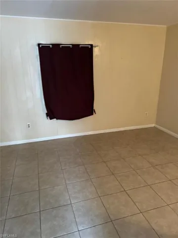 View of tiled spare room