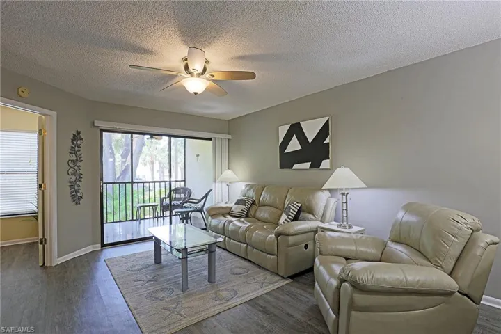 Living area featuring wood-finish flooring and neutral wall tones