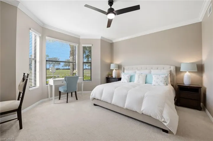 Primary Bedroom with great views, lots of natural light and a sitting or desk area