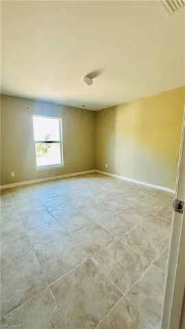 Empty room with baseboards