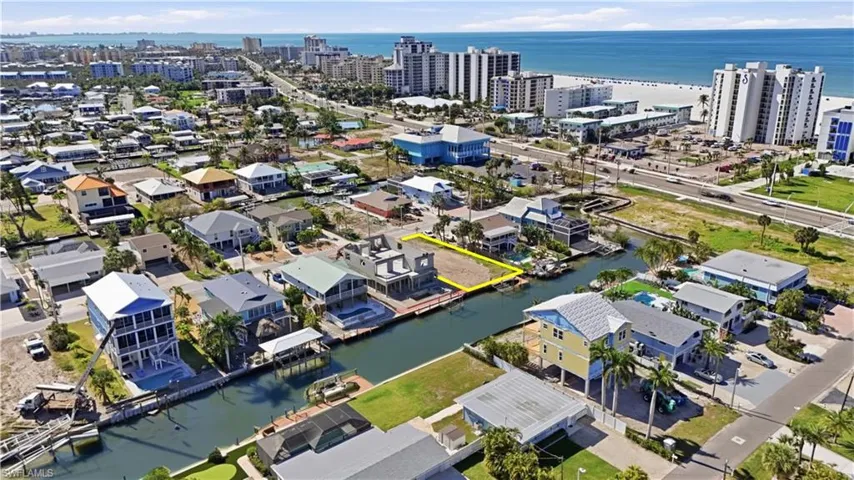 View of urban area featuring a nearby body of water - Virtually Edited Image