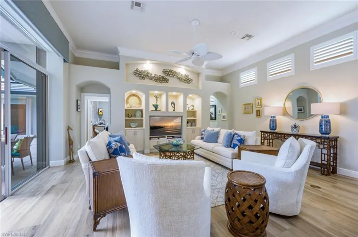 Porcelain Tile Floors throughout the house and Custom Electric Privacy Shades for the sliders
