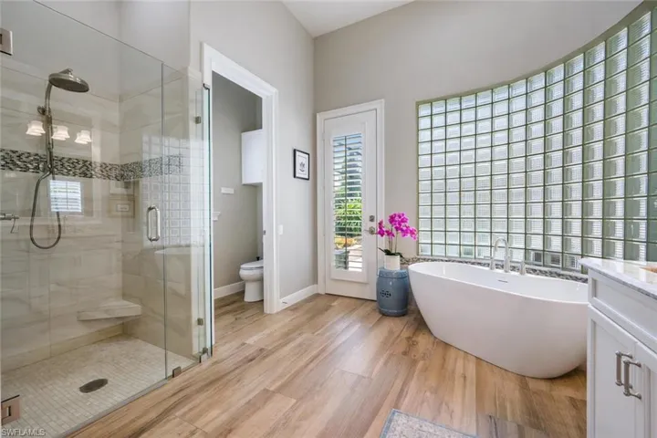 Master bathroom with separate water closet