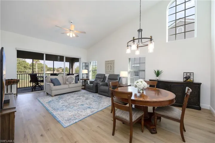 Living/Dining area with vaulted ceiling  and lots of natural light