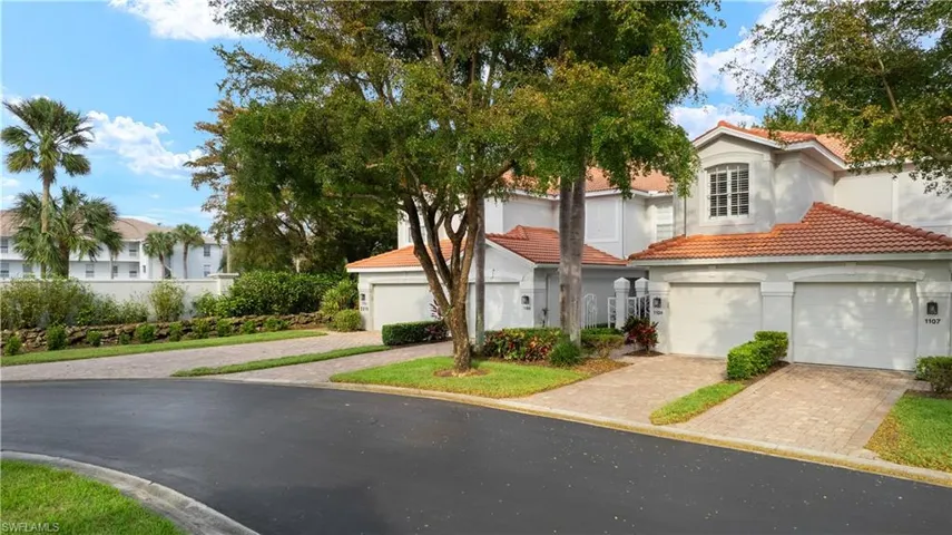 Carriage Home with One Car Attached Garage and Center Courtyard Entry