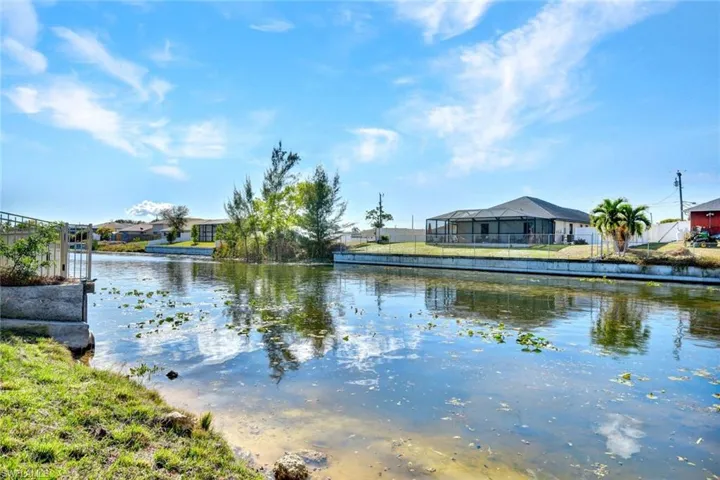 Water view with nearby suburban area