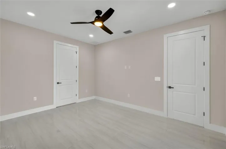 Unfurnished room with recessed lighting and a ceiling fan