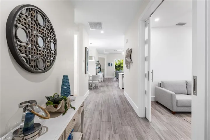 Stunning foyer entryway. Plank tile flooring throughout.