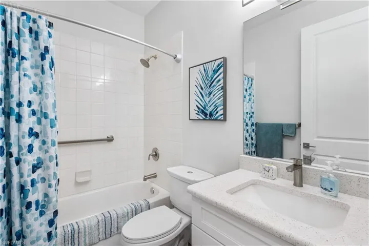 2nd full bath offers shower/tub combination. Sparkling white quartz countertop comfort height vanity.