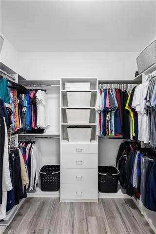 Primary suite has oversized custom closet.