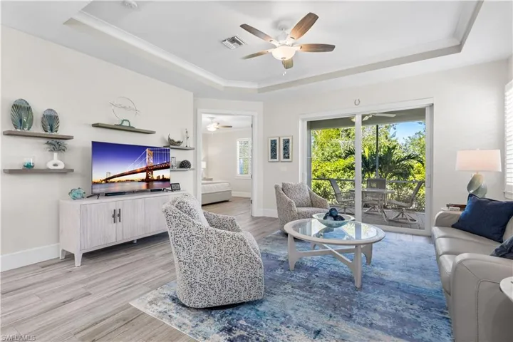 Tray ceilings, beautiful plank tile flooring throughout.