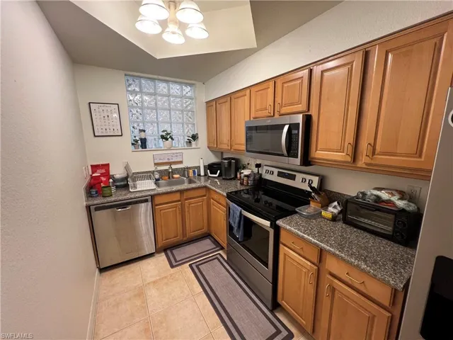 Kitchen with stainless steel appliances with granite countertops