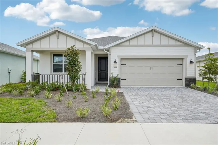 View of front of home with a garage