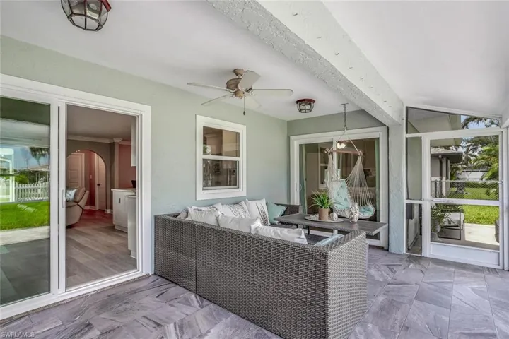 Dining space with light wood-type flooring, a ceiling fan, ornamental molding, and recessed lighting