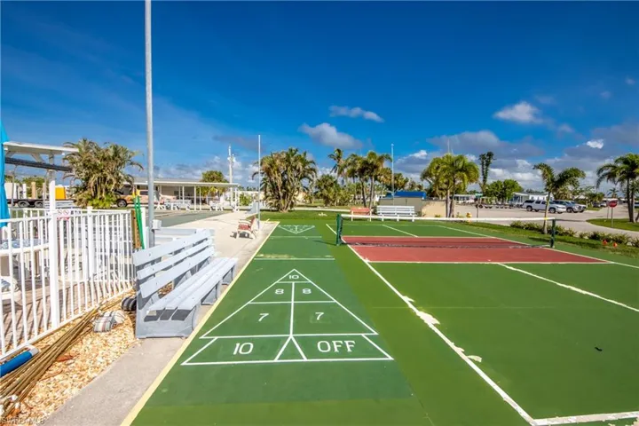 Surrounding community with shuffleboard, Pickleball court and Bocce ball