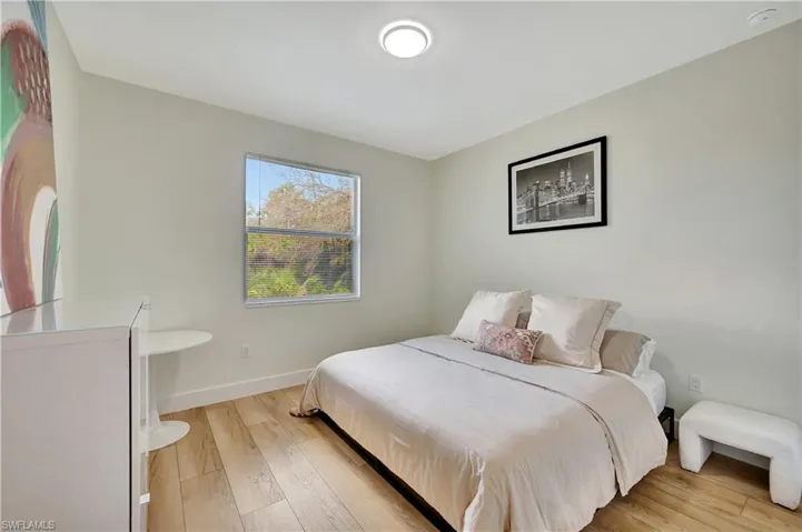 Bedroom with light wood-type flooring